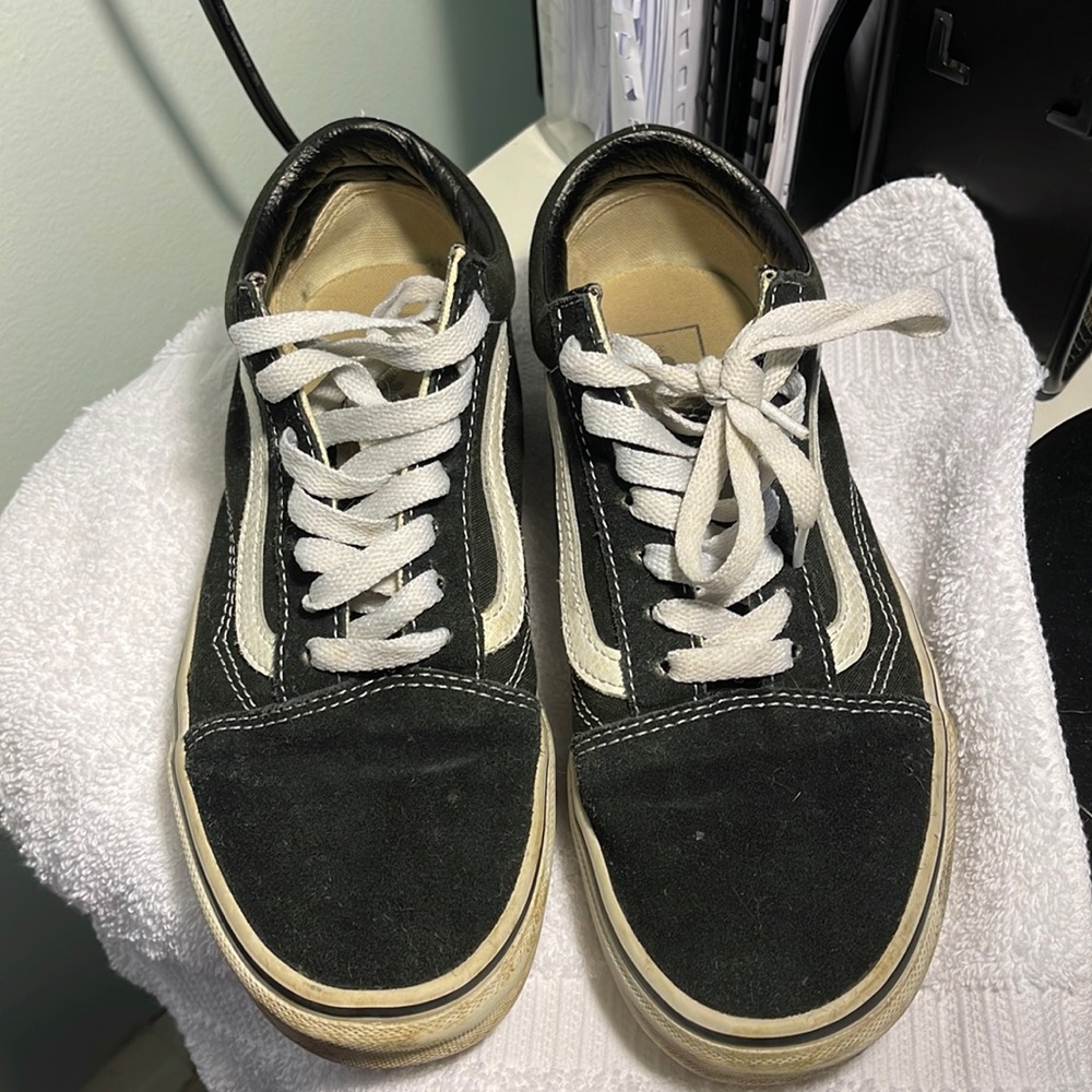 Vans in a size 7.5 color is black and white